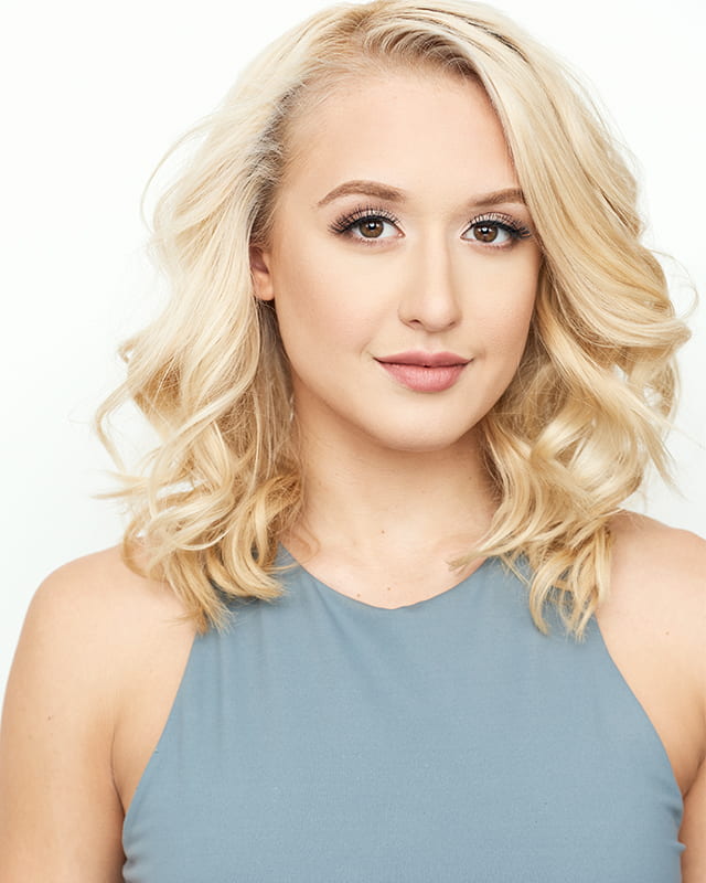 headshot of young blonde woman
